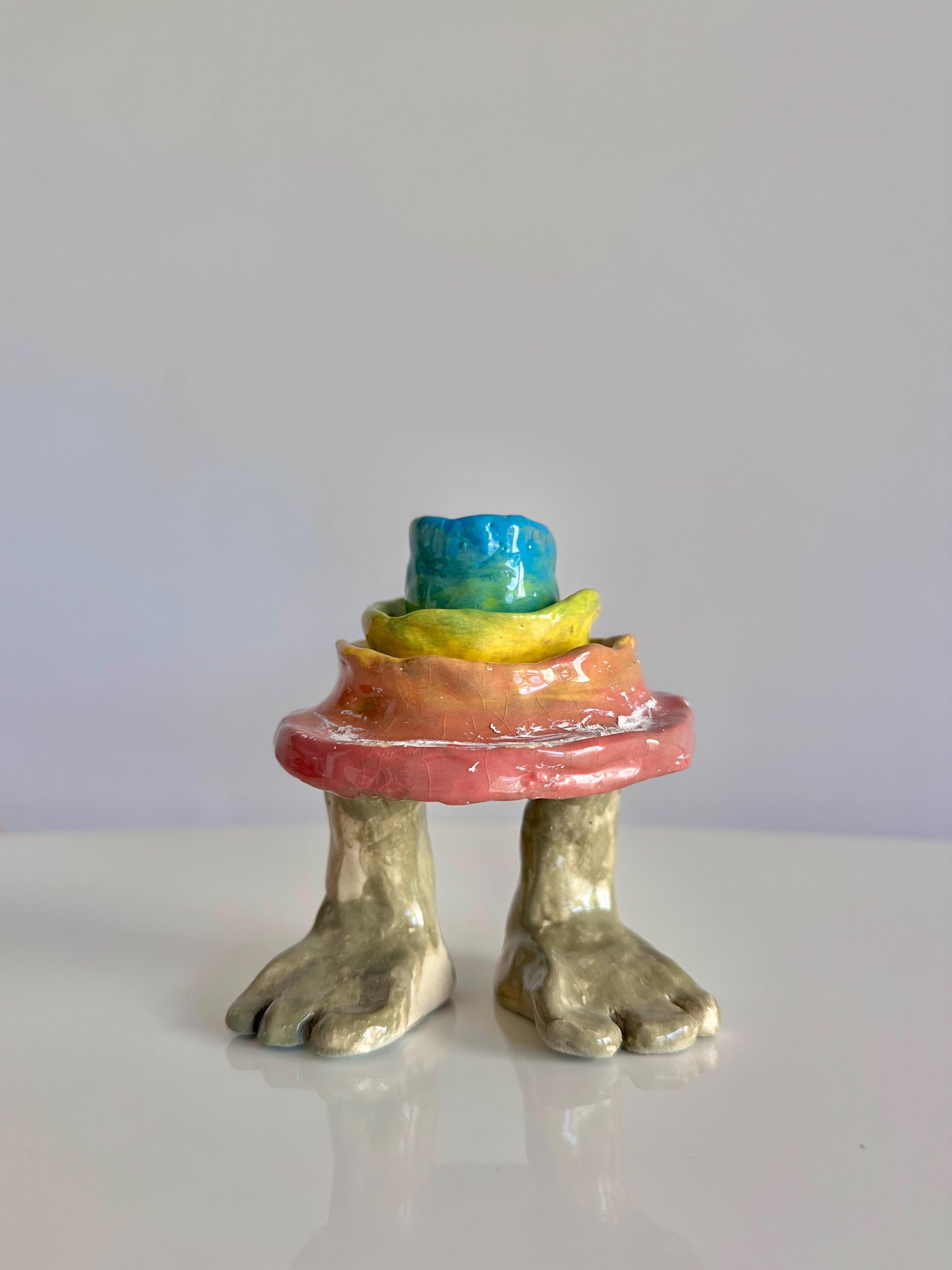 rainbow layered mud cake sculpture