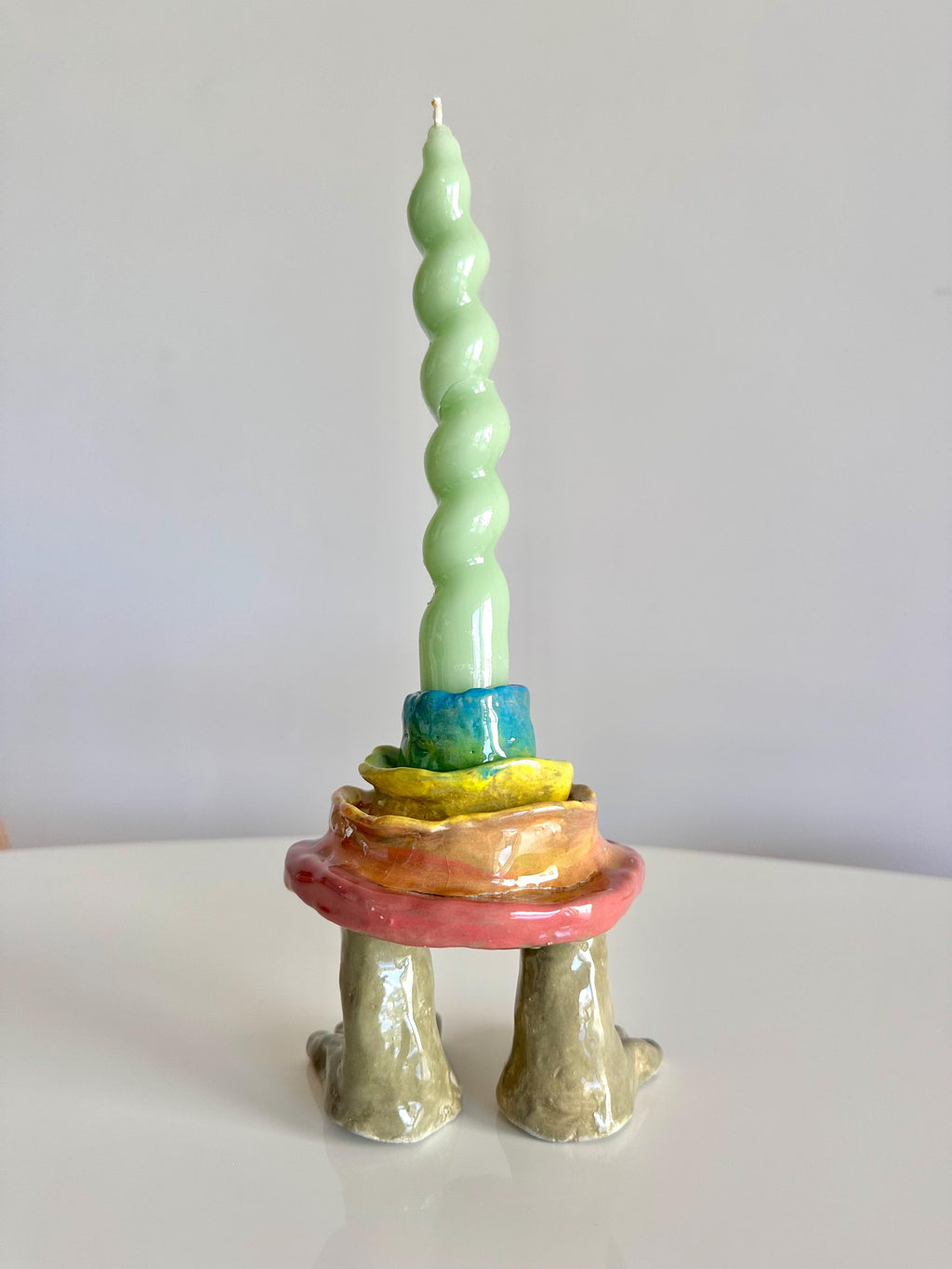 rainbow layered mud cake sculpture